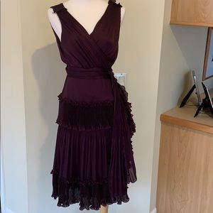 DVF Women’s Tiered Wrap Dress – Size 10. Elegant and flattering design.